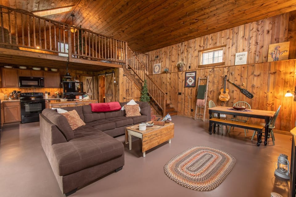 Stairs to loft, dining table, sectional