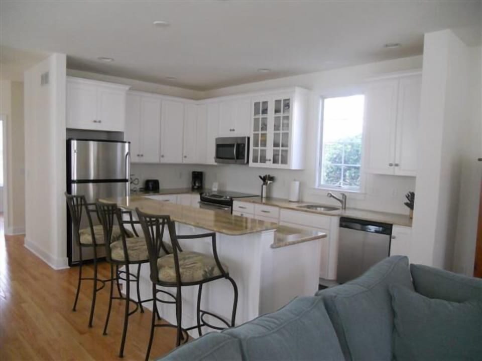 Kitchen open to living and dining rooms