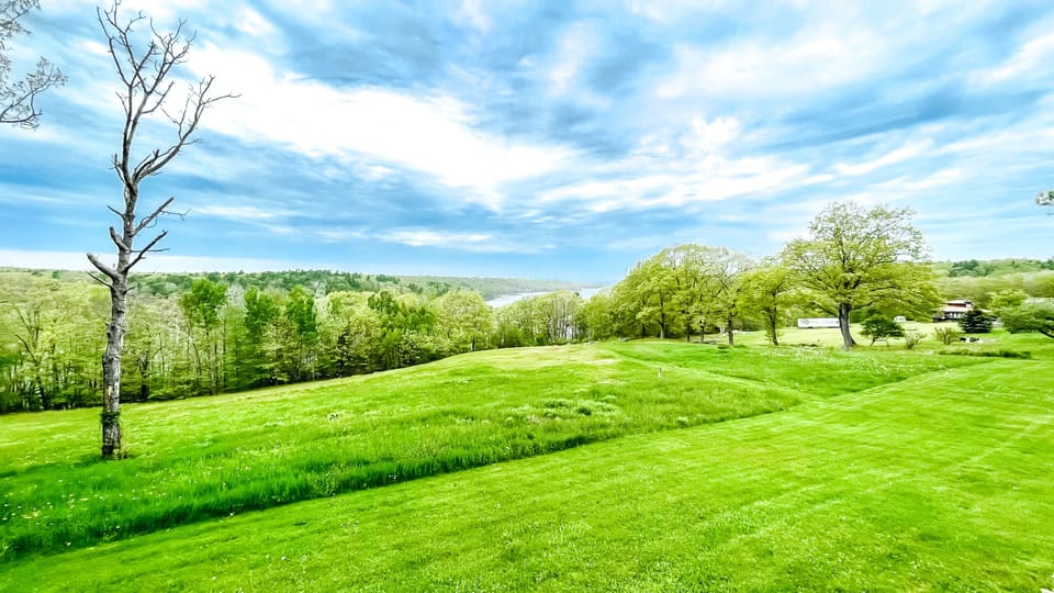 Field and view of the Penobscot River