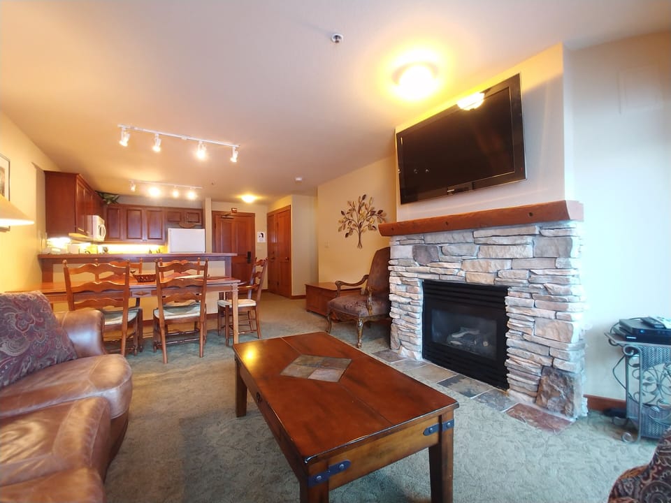 Family room, eating area, and kitchen