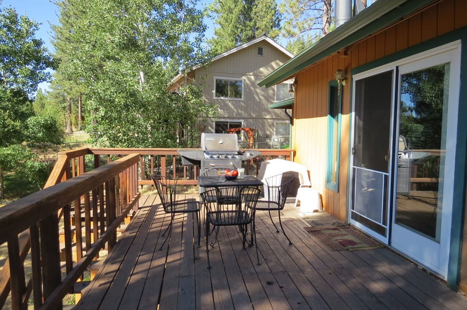 Grill and dining on back deck, opens from living room. 