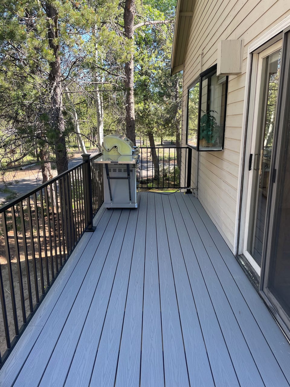 Large grill with natural gas connection just outside the kitchen slider