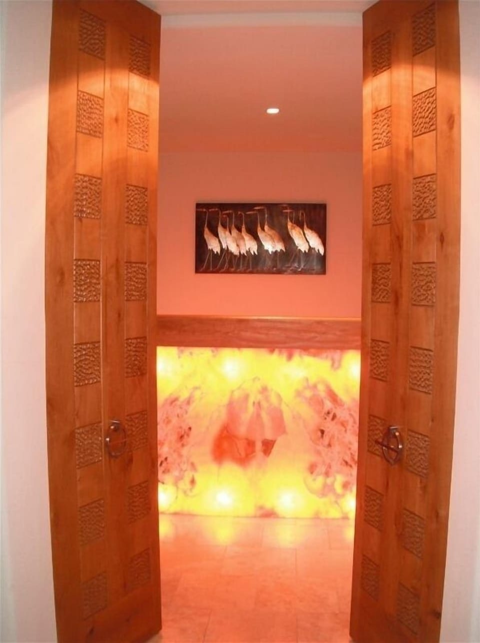 Beautiful wood carved doors leading into the master bedroom #1