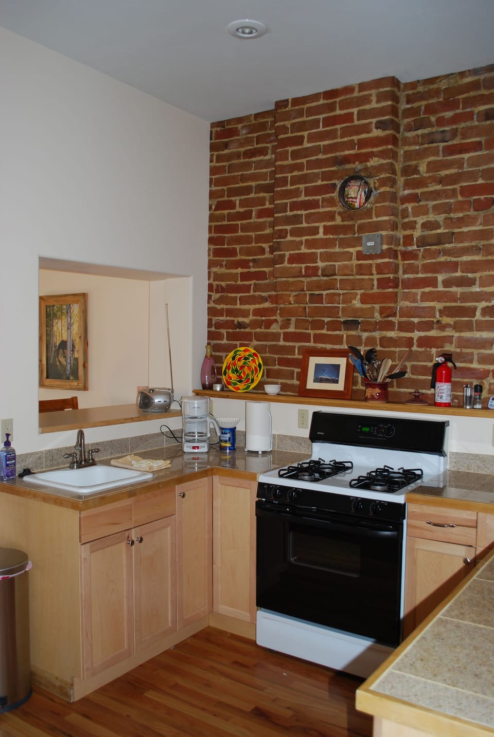 Appliances: gas range, dishwasher, refrig, coffee maker, microwave & blender