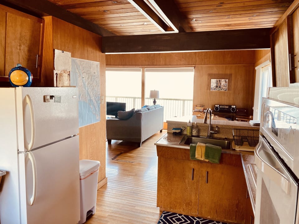 Kitchen open to living area. 