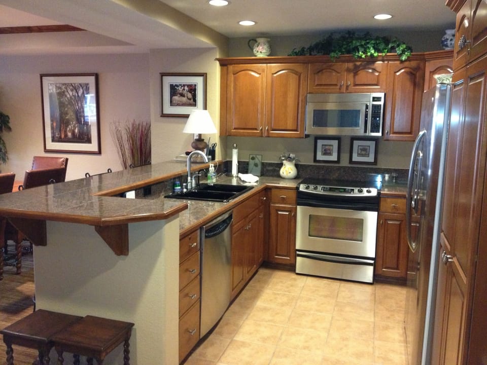 Kitchen- dining area to left behind counter