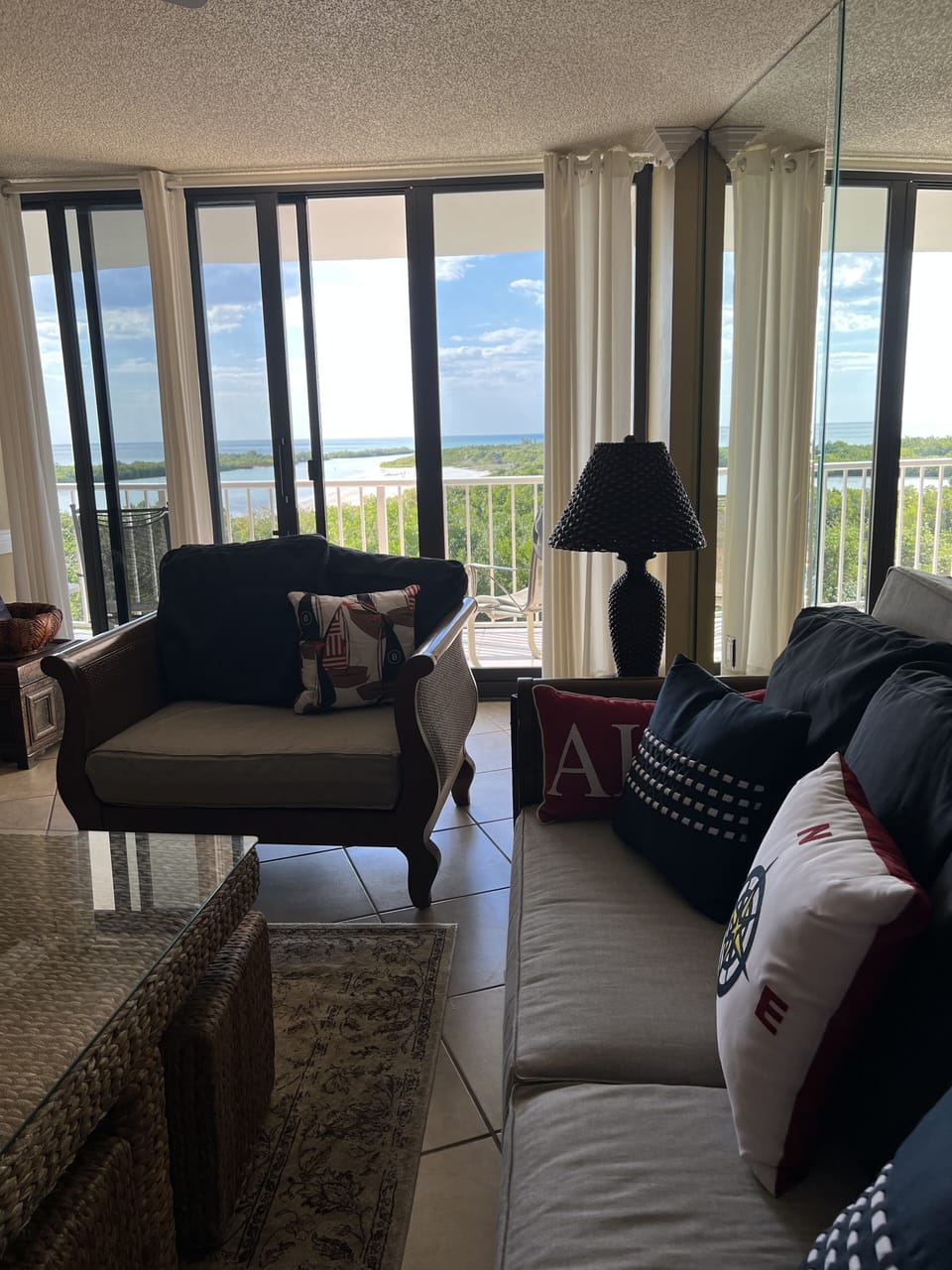 View from living room: Gulf, lagoon and green lush island vegetation