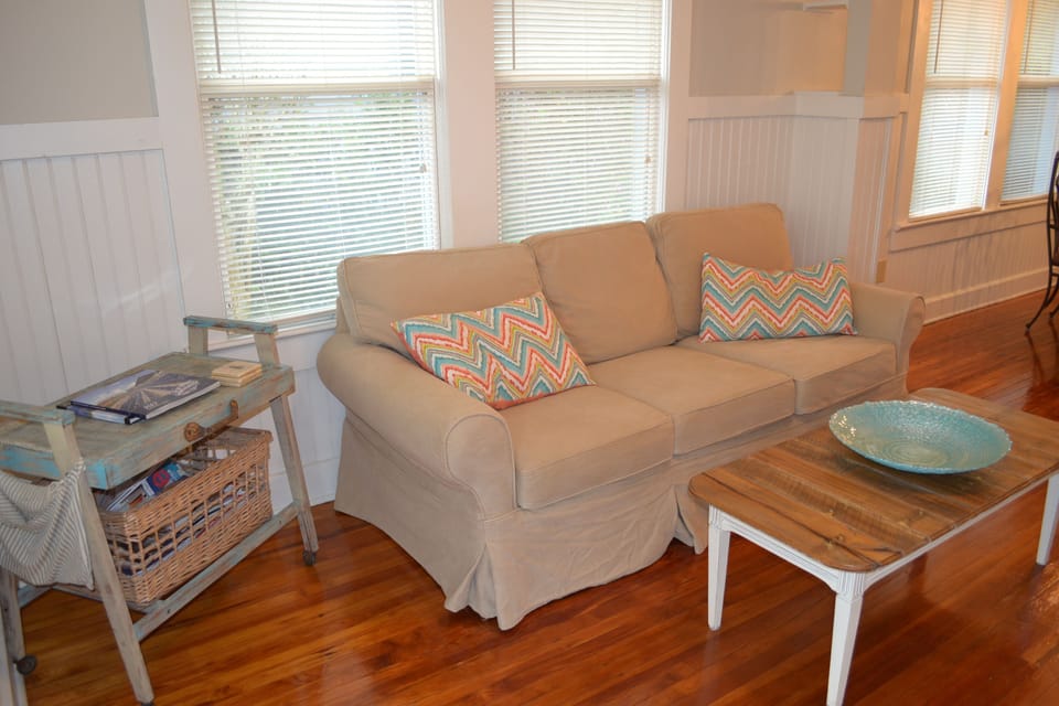 Slipcovered sofa affords the ability to launder entire surface regularly.