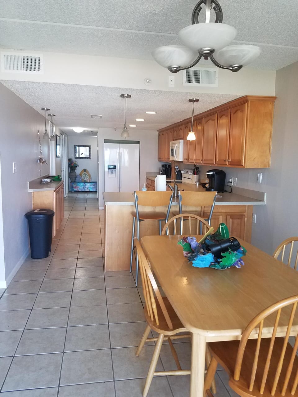 Dining area-note: table has been replaced with bumper pool/poker/dining table