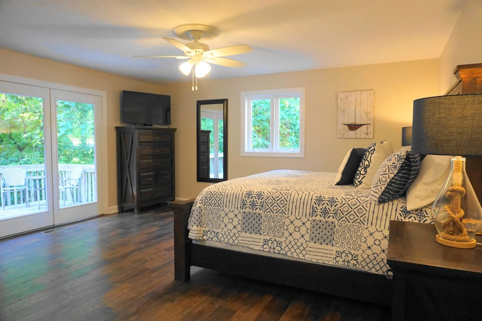 Master Bedroom with French doors to the back deck. 