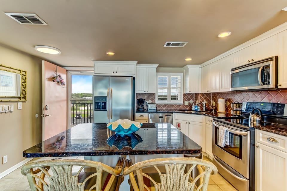 Fully-Equipped Kitchen with Island Seating for 2