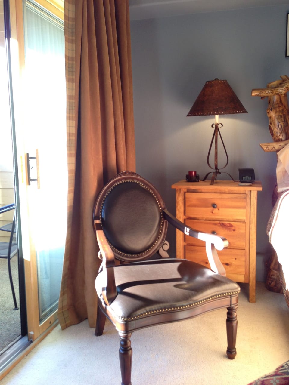 Comfortable reading chair and ottomon for relaxing in the master suite