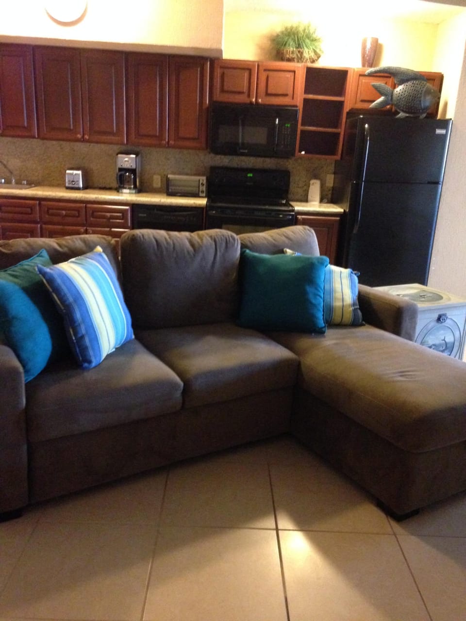This is Bedroom 6 which has a kitchen, queen bed, table for 4, sleeper sofa