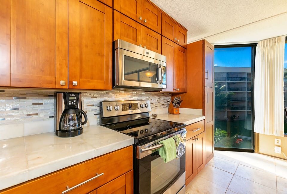 Floor to ceiling cabinets stocked.  All your kitchen needs included.