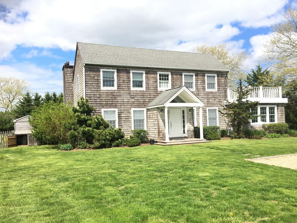 Classic shingle Southampton home with spacious front and backyard garden - pool.