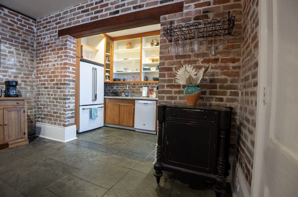Cook in style with our fully equipped kitchen featuring modern appliances.