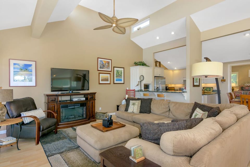 Living area opens to kitchen and dining area.