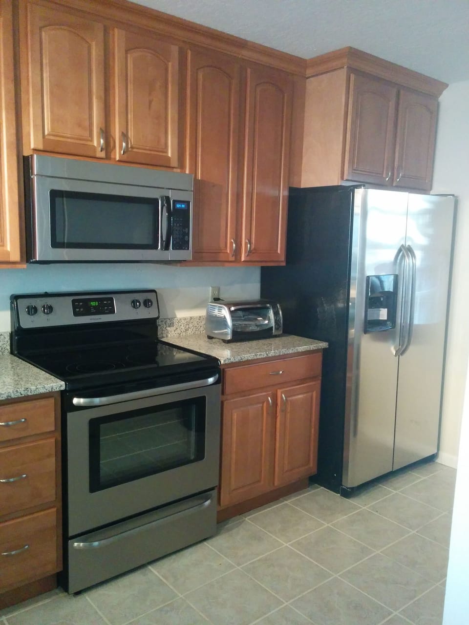 Fully stocked kitchen with 42 inch maple cabinets