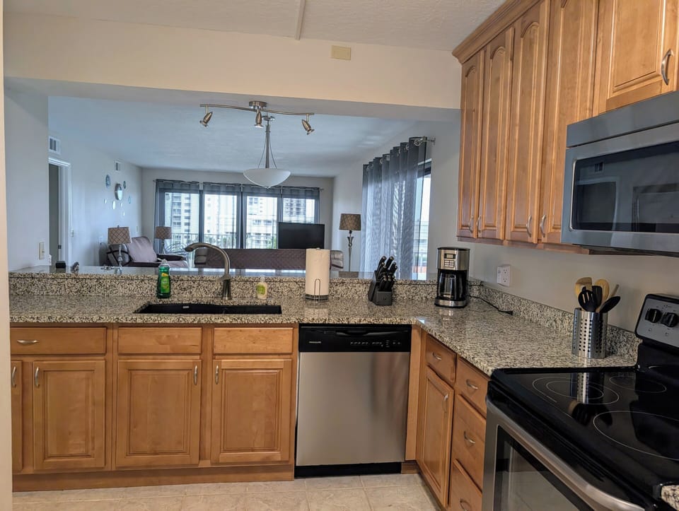 Open concept kitchen with a view of the Dining and Living rooms