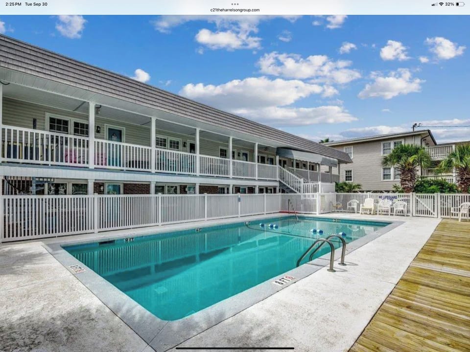 Building #1, steps across the street to the beach