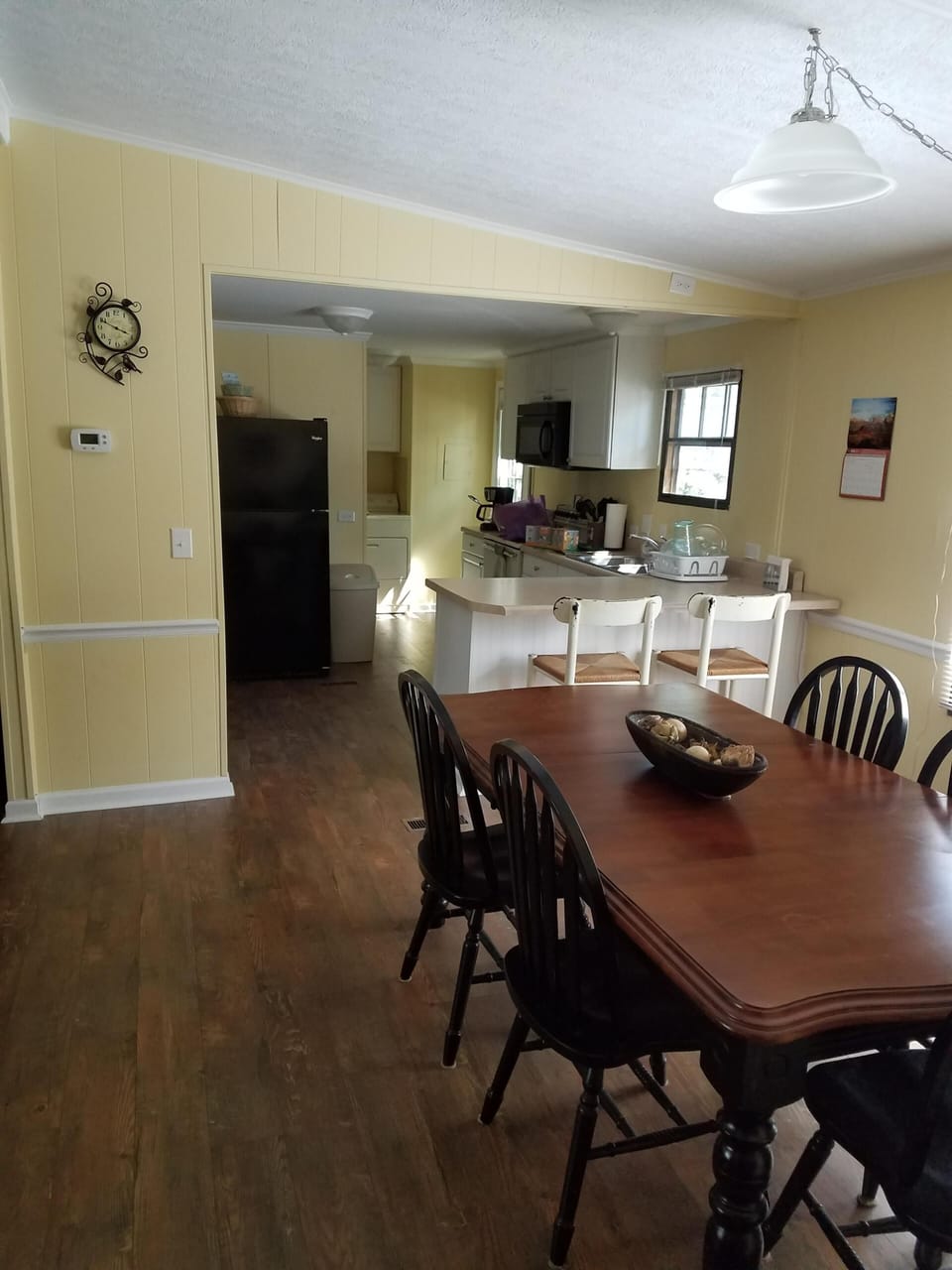 Dining room table and 6 chairs.  Opens to kitchen and family room.