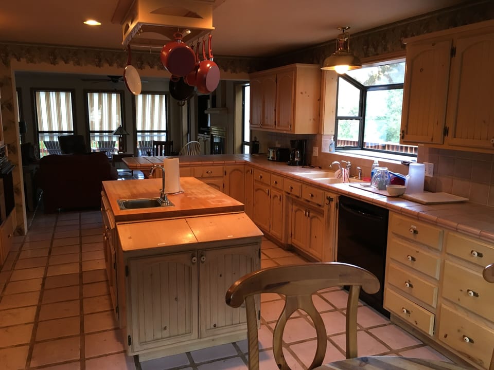 Large chef's kitchen with butcher block island