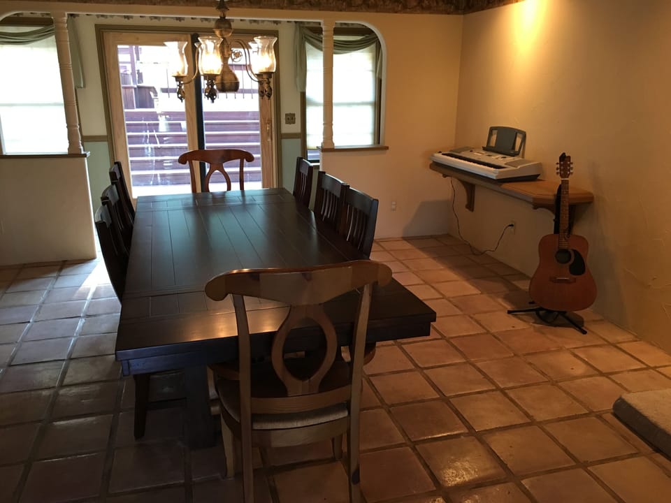 Large formal dining table seats 10