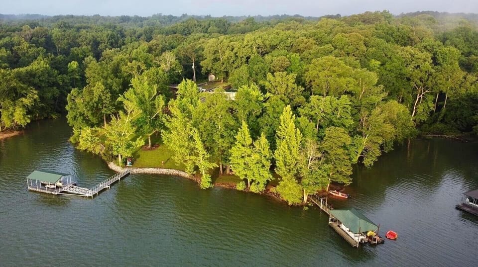 An aerial view of our point property with this house and dock on the right