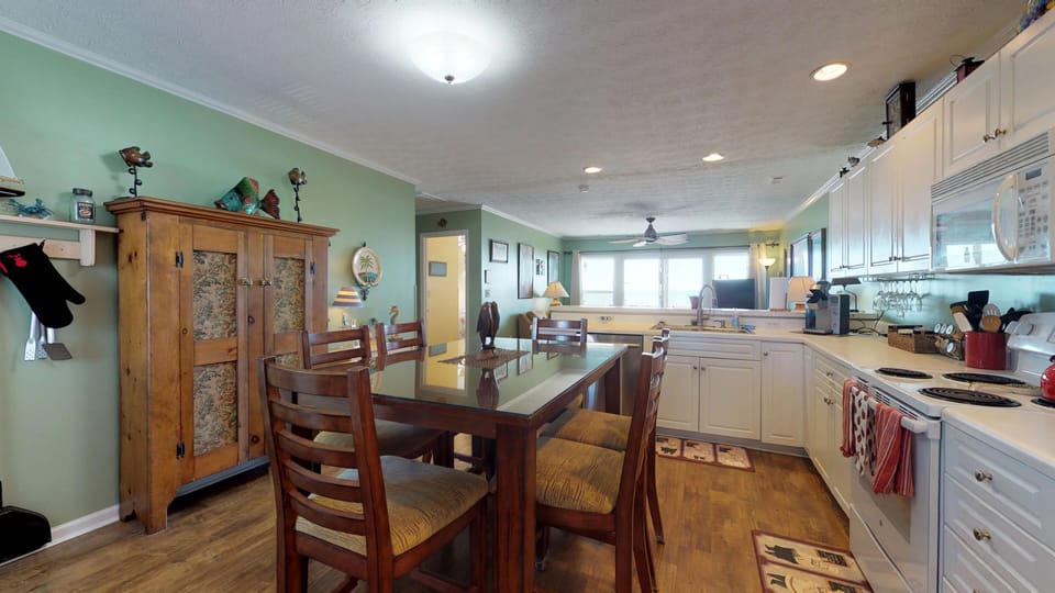 Kitchen with amoire full of games
