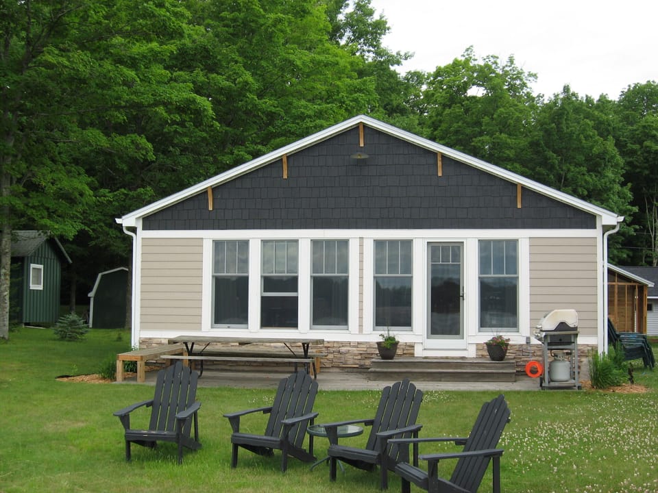Front view, facing lake, which is literally steps away. Newly re-done.