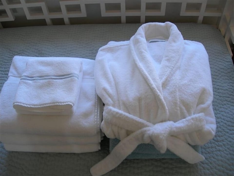 Robes, fine linens, and boutique hotel amenities