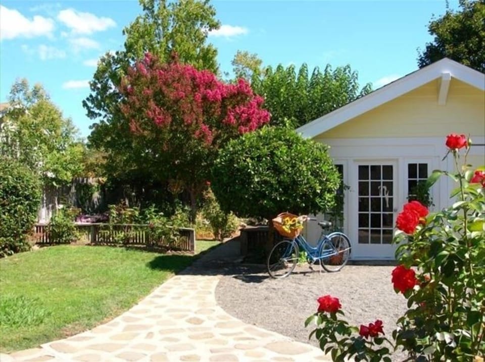 Private fenced yard and gardens