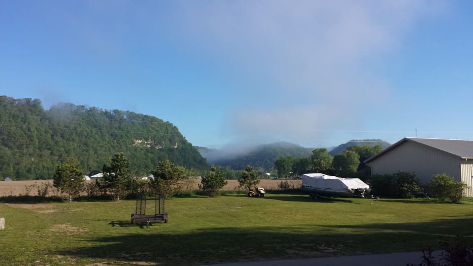 Large grassy area available for parking, outdoor games