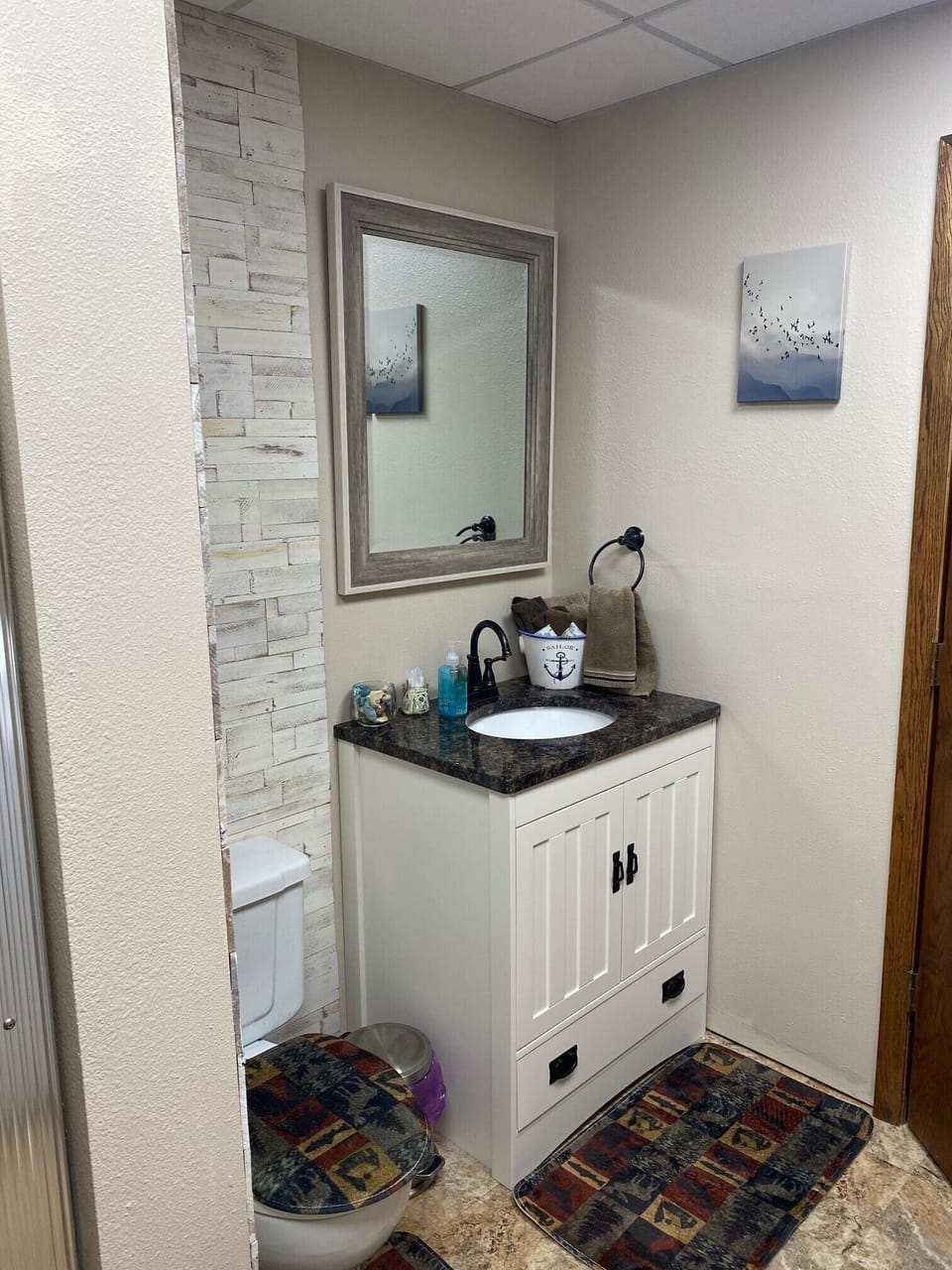 Basement Bathroom with shower; full size washer and dryer