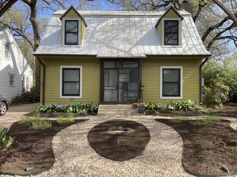 Front of house.  Parking is right from of house.  