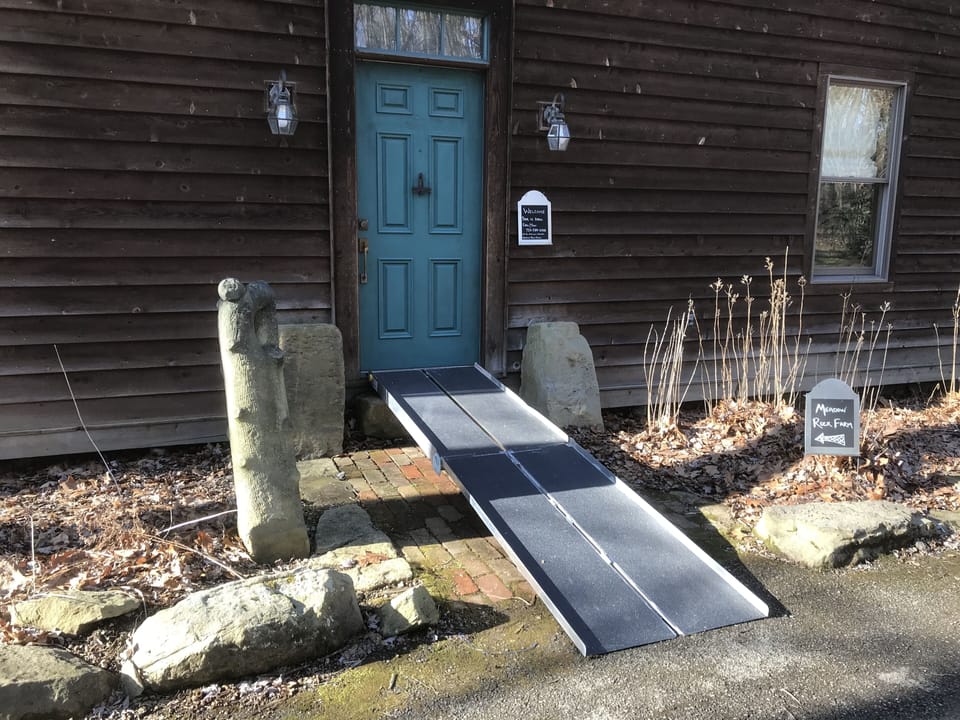 The front door is 35" and there is a portable ramp available, by request