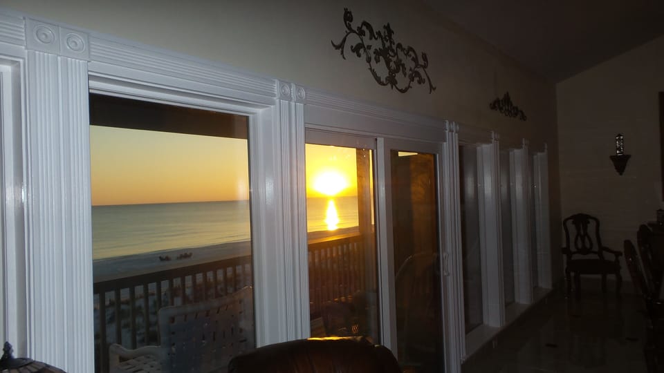 Gorgeous sunsets seen over the ocean through 10 floor-to-ceiling windows.