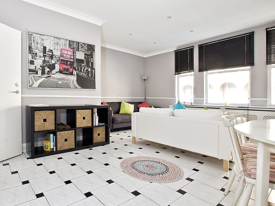 Lovely black & white tiled floors and large picture windows!