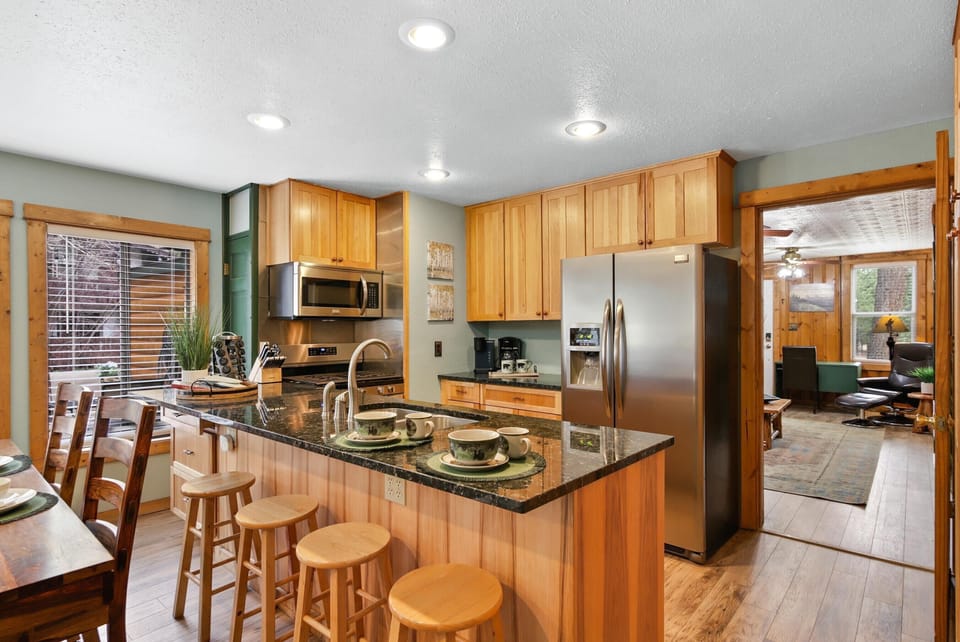 Fully equipped Riverfront kitchen. Granite counter tops.  Bar stools.  