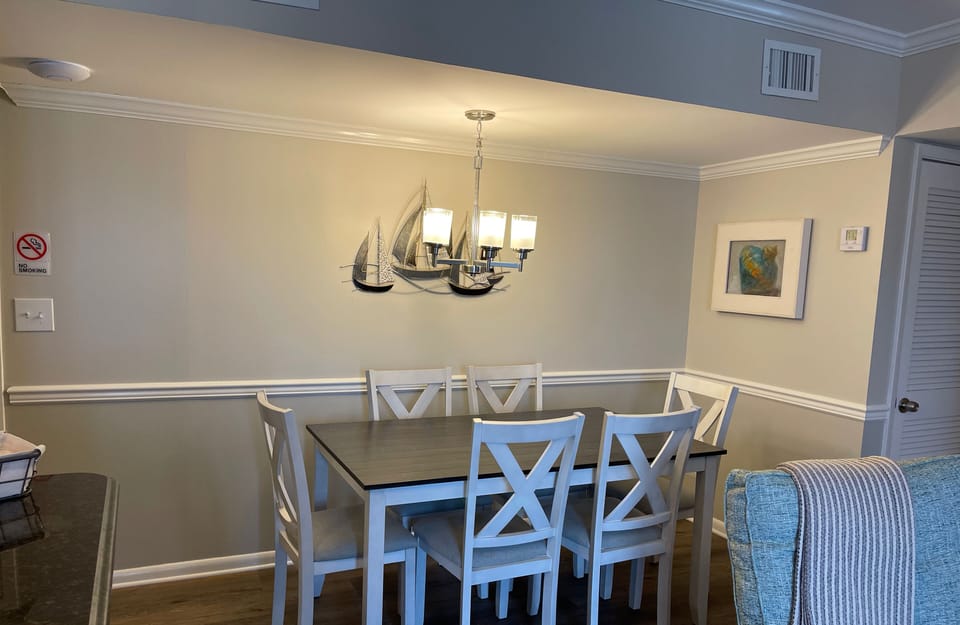Dining area perfect for a family meal or a game of cards!