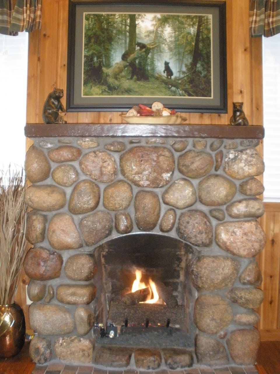 Lovely fire!   The artwork is 'Morning in a Pine Forest'..