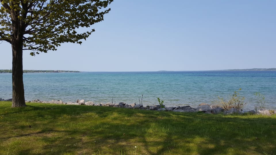 Quiet areas along West Grand Traverse Bay, steps away.