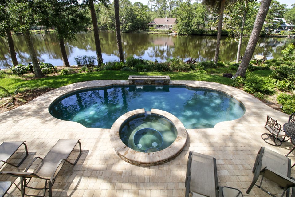 Pool and Spa (both receive ample sun).  Dock is found to the far right.