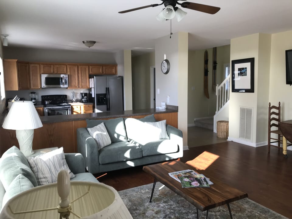 View of family room and kitchen.