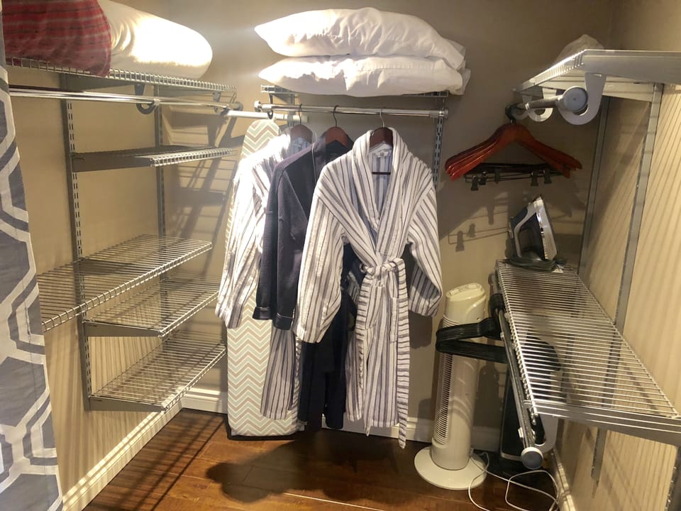 Walk in closet lots of space for storage, extra bedding and cosy robes 