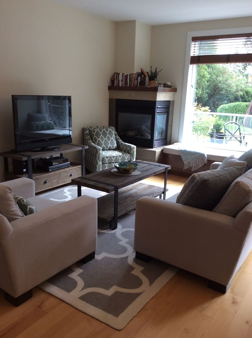 Living room w/ furniture from Urban Barn and window seat cushion for relaxation