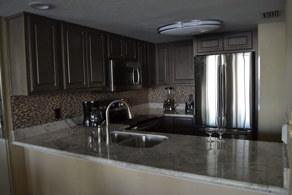 New cabinets and granite counter tops.