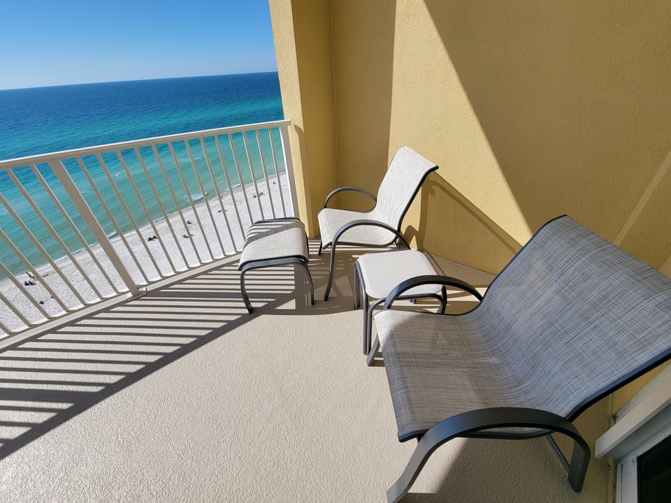 Two Sitting Chairs on Large Balcony