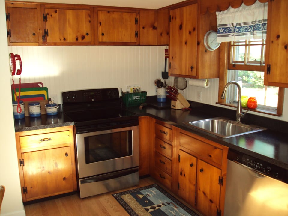 Kitchen with full appliances and the necessary utensils for a comfortable stay.