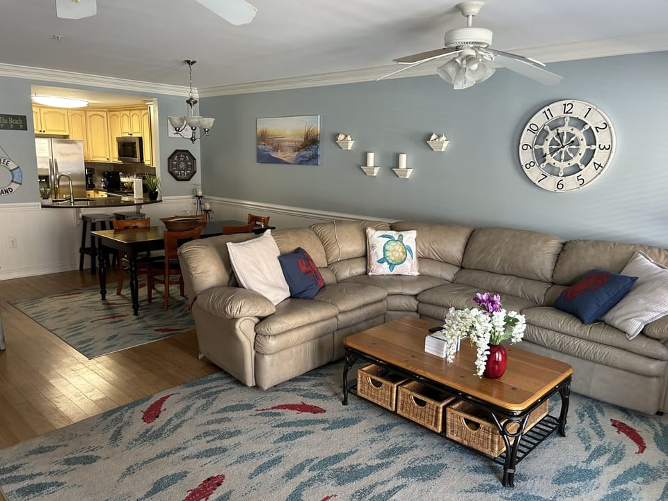 New L-Shaped leather Couch w/2 recliners & Sofa Bed